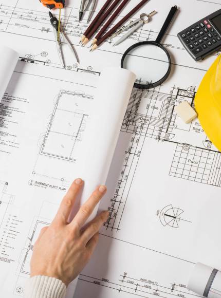 crop-architect-opening-blueprint